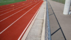 concrete path near running track